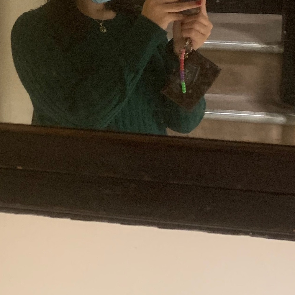 dark green sweater